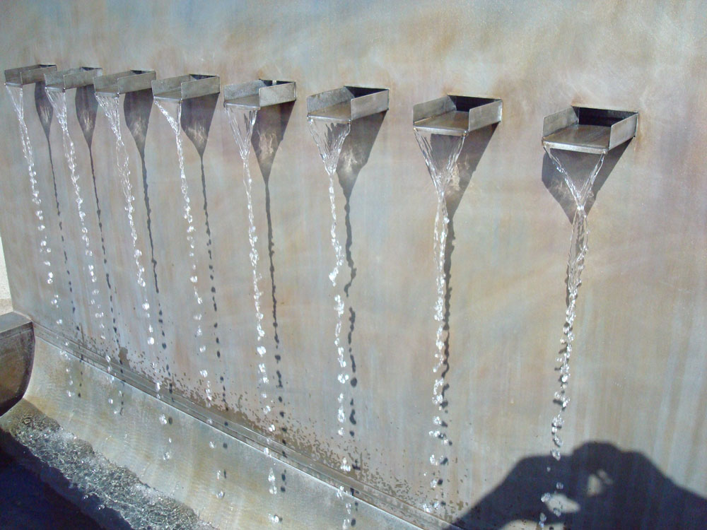 Fontaine murale zinc avec plusieurs jets